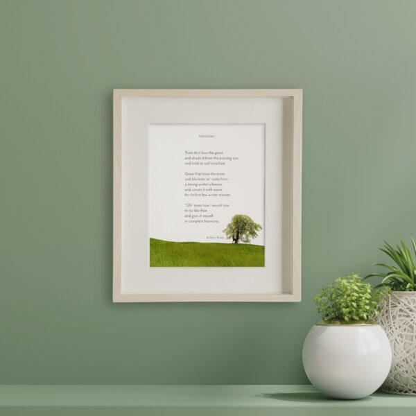 Cozy home interior with Felix Doolittle's hand-drawn watercolor giclée art print of the poem Harmony, showcasing inspirational poetry in calligraphy with soft watercolor tones, styled on a modern wall for calm, mindful home decor inspiration.